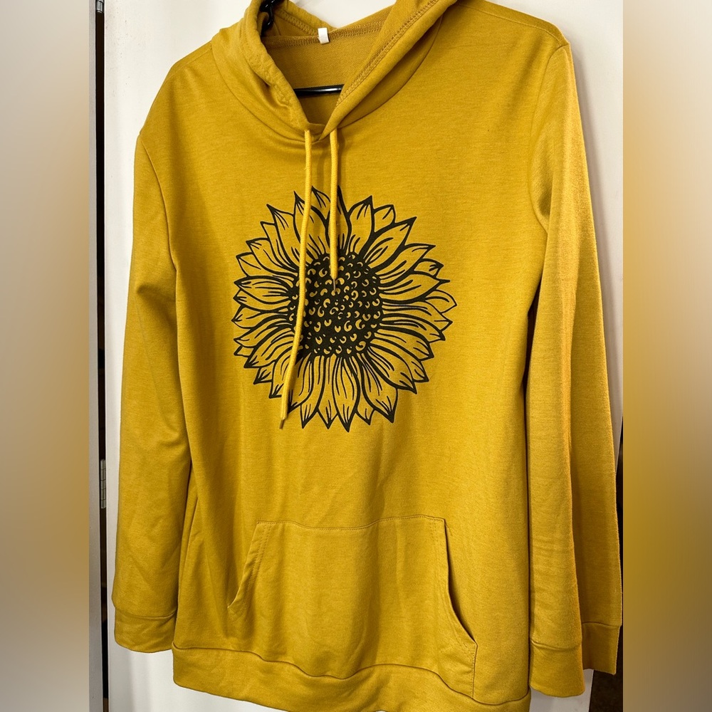 Mustard colored sunflower size medium hoodie.